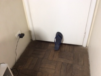 Shoe against door