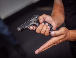 Cop, shot in head, wins gunfight